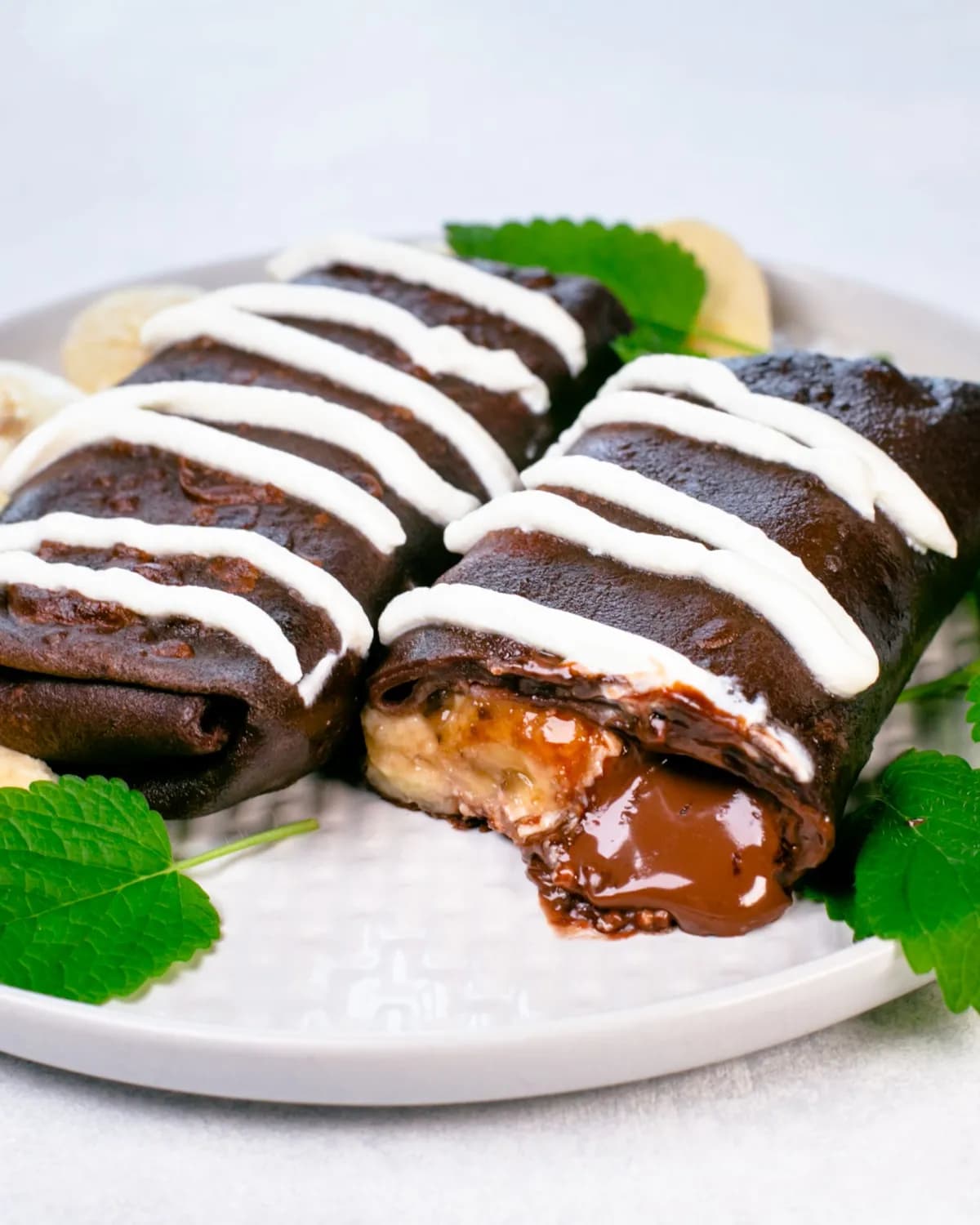 Chocolate crepes with cheese, banana, and nutella