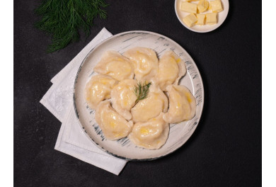 Potato pierogy with butter (varenyky)